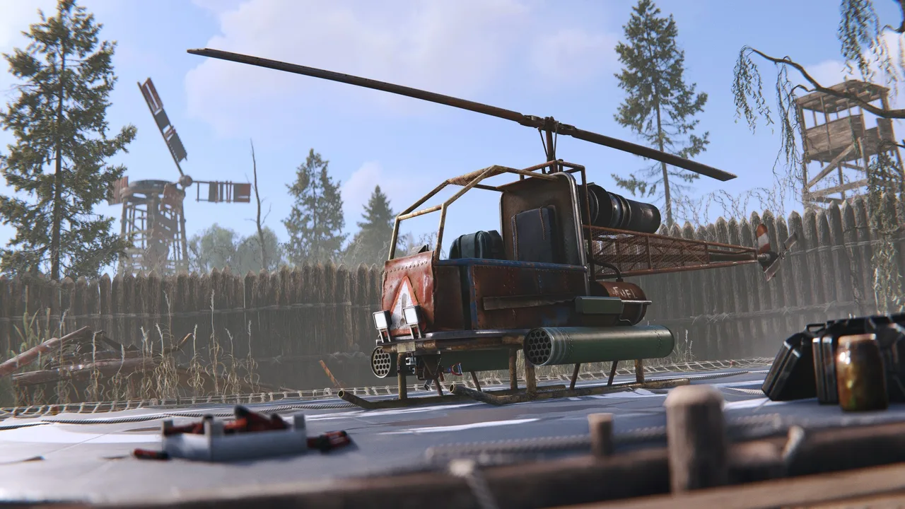Ударный вертолёт Rust на посадочной площадке Air Wolf в Bandit Camp: тёмный корпус, носовая турель и разметка площадки