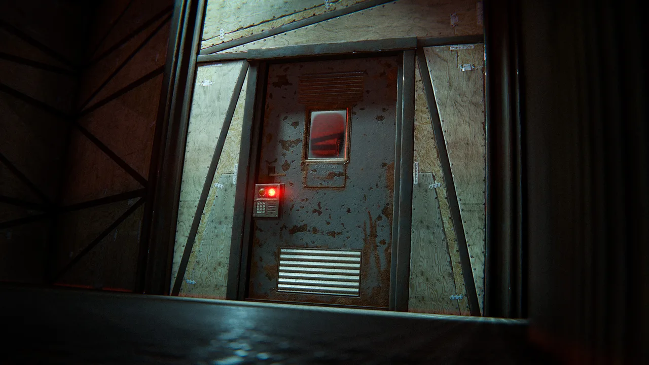 Металлическая дверь Rust в проёме из фанеры и стальных распорок, на ней кодовый замок с горящим красным индикатором