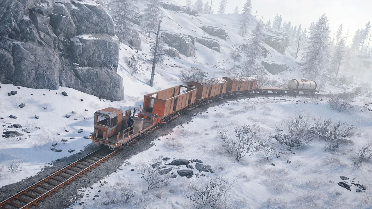 Дрезина Rust FP-6 с открытым полувагоном, двумя крытыми вагонами и цистерной едет по заснеженной горной дороге